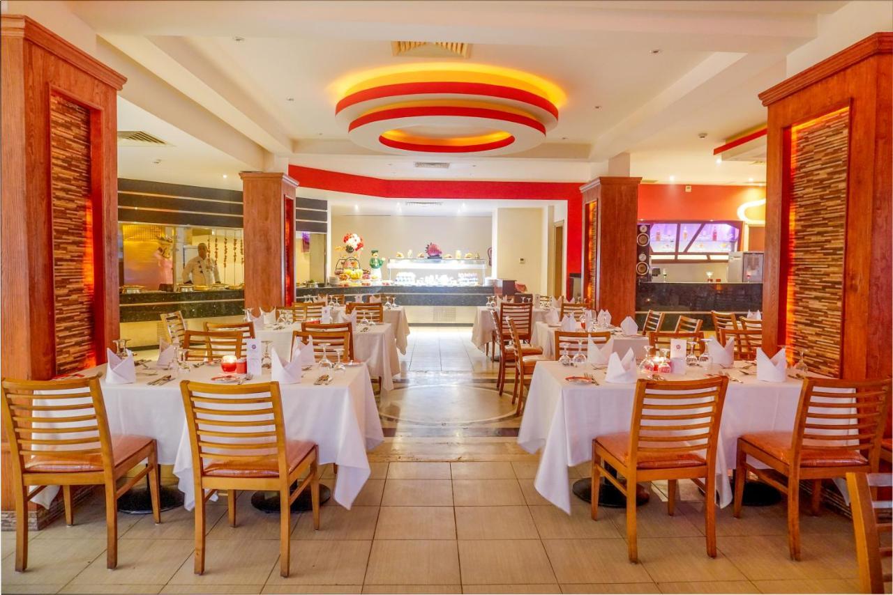 Charmillion Club Aquapark Hotel Sharm el-Sheikh Ngoại thất bức ảnh The interior of the restaurant