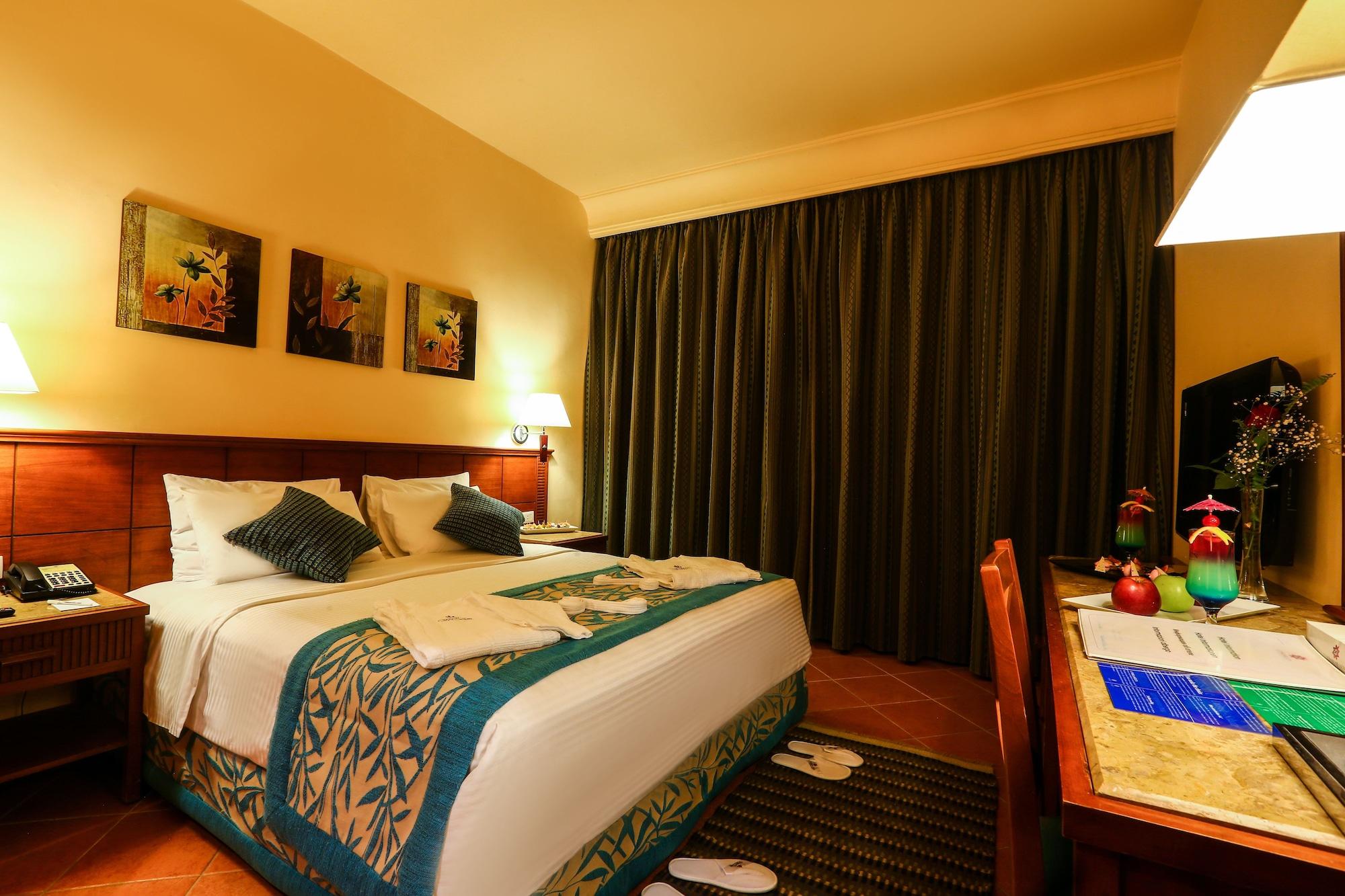 Charmillion Club Aquapark Hotel Sharm el-Sheikh Ngoại thất bức ảnh A bedroom at the hotel