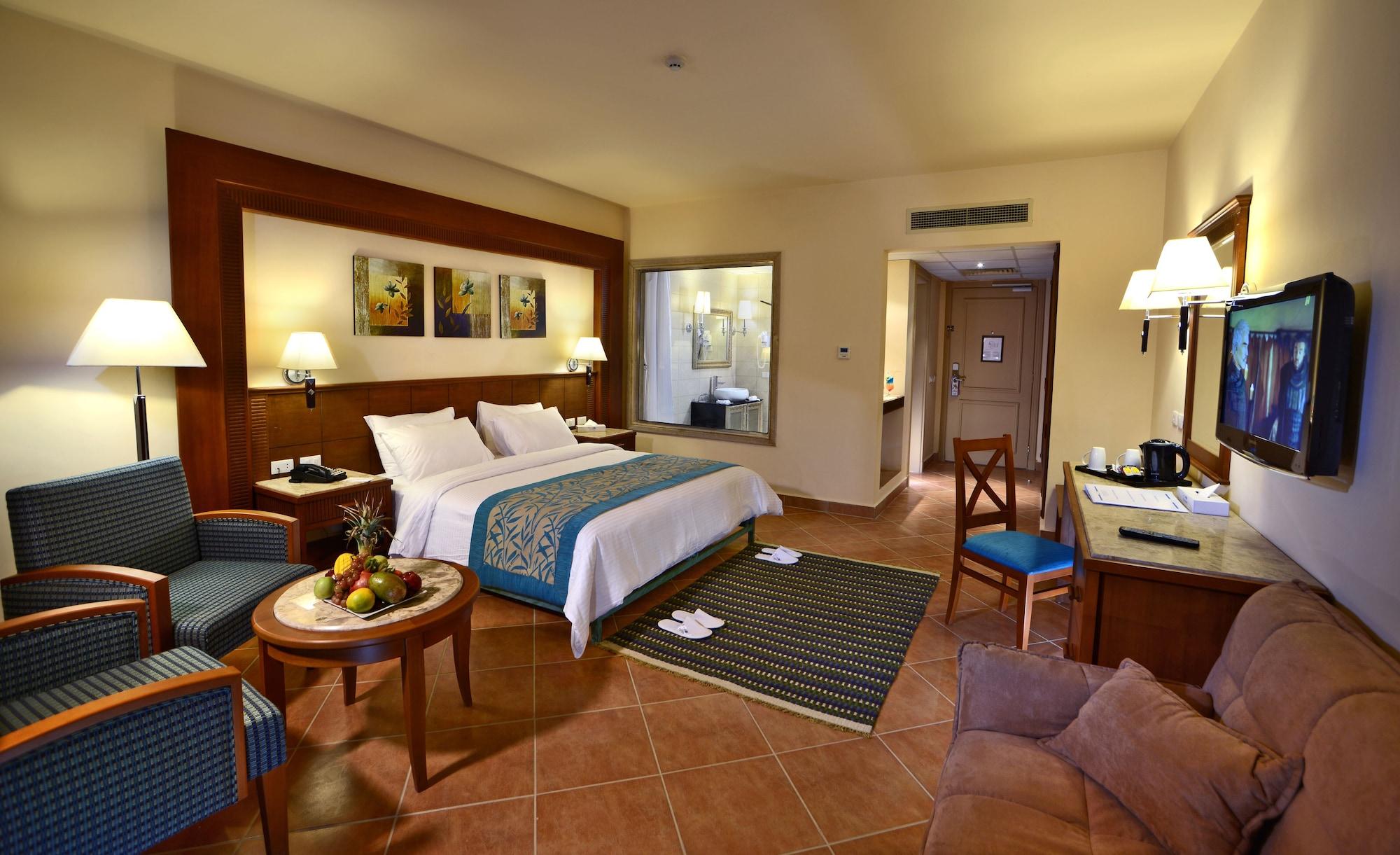 Charmillion Club Aquapark Hotel Sharm el-Sheikh Ngoại thất bức ảnh A room at the Hilton Sharm El Sheikh